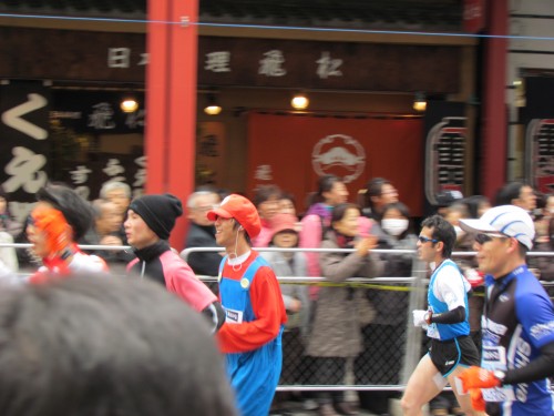 Mario fleeing the zombies during the tokyo marathon