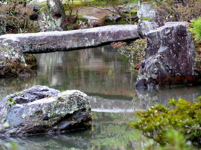 stone bridge over pond