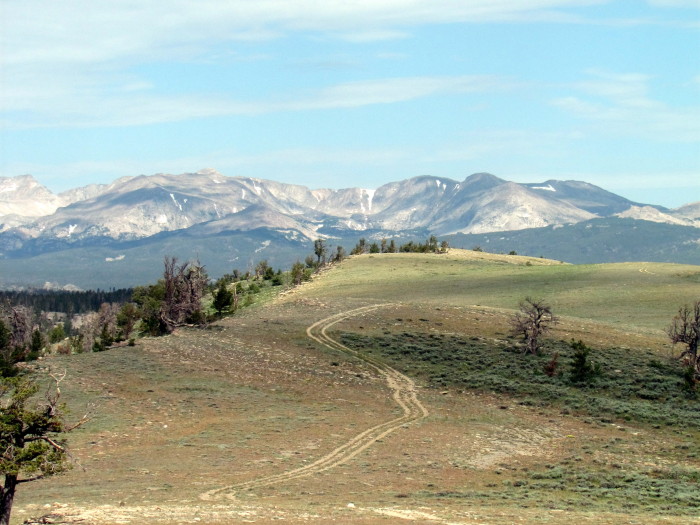 The Winds looming over the two-track to Main Wall